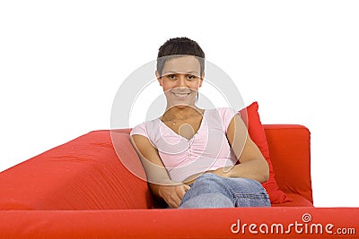Woman on the red sofa Stock Photo