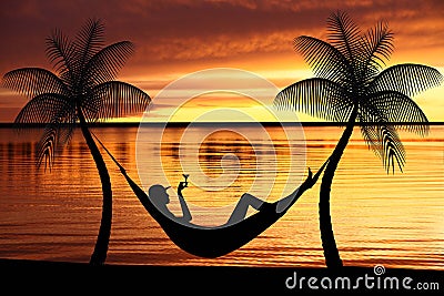 Woman relaxing in a hammock Stock Photo