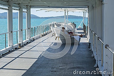Woman Relaxing On Hotel Pier Editorial Stock Photo