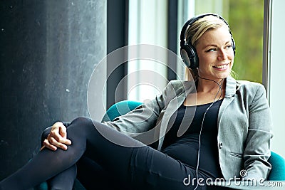 Woman relaxing listening to music Stock Photo