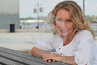 Woman relaxing outside Stock Photo