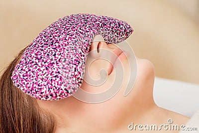 Restorative eye pillow covers eyes Stock Photo