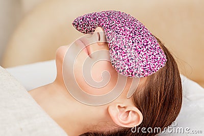 Restorative eye pillow covers eyes Stock Photo