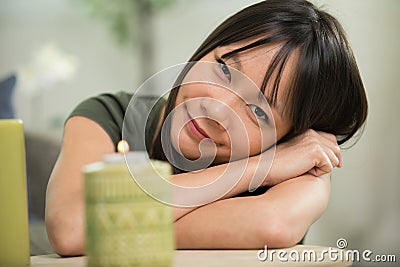 woman relaxing by candles Stock Photo