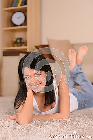 Woman relaxing on the weekend. Beautiful young woman lying on th Stock Photo