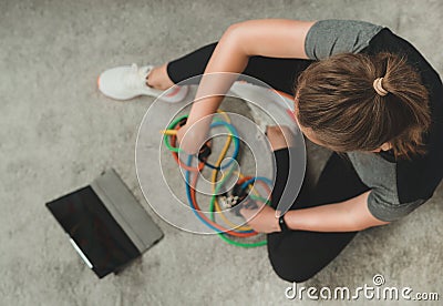 Woman with resistance bands Stock Photo