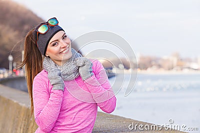 Woman resting after doing sports outdoors on cold day Stock Photo