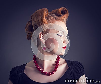 Woman with Retro Golden Hair Style. Stock Photo