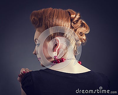 Woman with Retro Golden Hair Style. Stock Photo