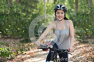 Woman riding bicycle Stock Photo