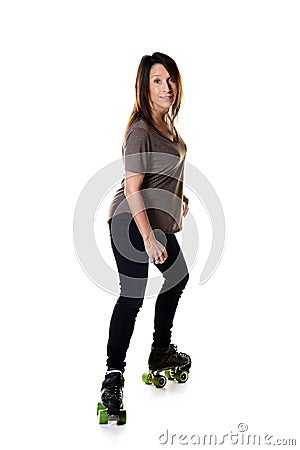 Woman roller skating sideways on quad skates Stock Photo