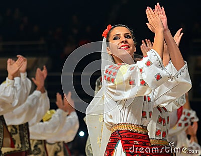 Woman in Romanian traditional outfit perform during dancesport competition Editorial Stock Photo