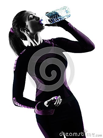 Woman runner running jogger jogging drinking water isolated silh Stock Photo