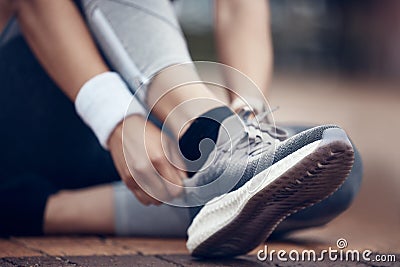 Woman, running shoes and city fitness for workout, exercise and training in wellness health, heart cardio or marathon Stock Photo