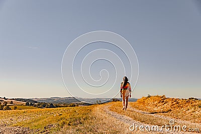 Woman runs barefoot Stock Photo