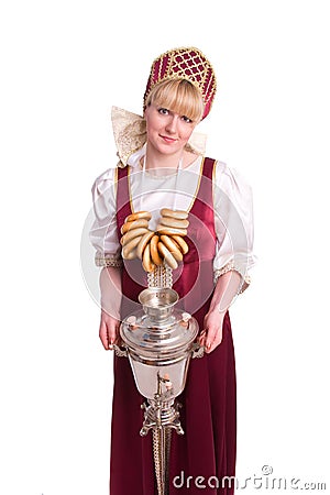 Woman in Russian costume with bread-ring Stock Photo