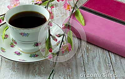 Woman's Bible with a cup of Coffee or Tea Stock Photo