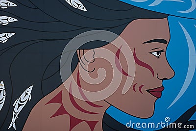 woman's face drawing on the wall blue background mermaid port canada place downtown vancouver canada 2023 Editorial Stock Photo