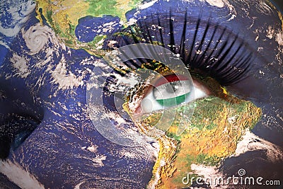 Woman`s face with planet Earth texture and hungarian flag inside the eye. Stock Photo