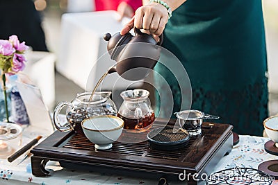 Woman`s hand making traditional Korean tea Stock Photo