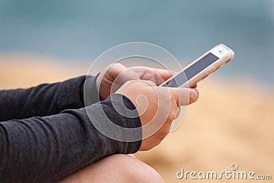 Woman`s Hands with Smartphone Texting Stock Photo