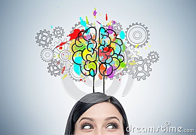 Woman s head, brain and cogs Stock Photo