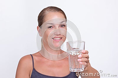 Woman of40s holding glass of pure water Stock Photo