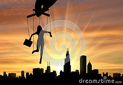 Woman`s marionette against of city Stock Photo