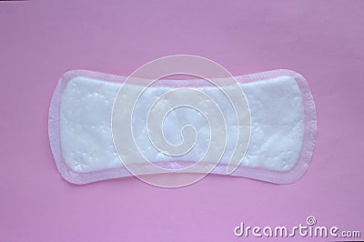 Woman`s Sanitary Pad on Pink Background, Feminine Hygiene Concept Stock Photo