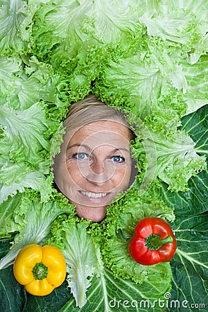 Woman with salal leafes around her head. Stock Photo