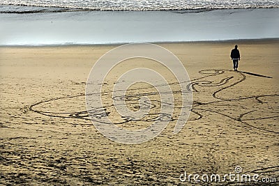 Woman Sand Painting Beach San Francisco Stock Photo