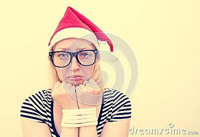 Woman with Santa's hat Stock Photo