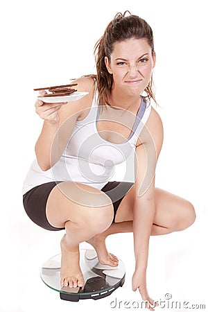 Woman scales chocolate Stock Photo