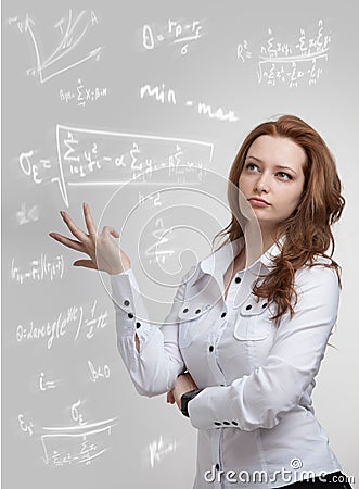 Woman scientist or student working with various high school maths and science formula. Stock Photo