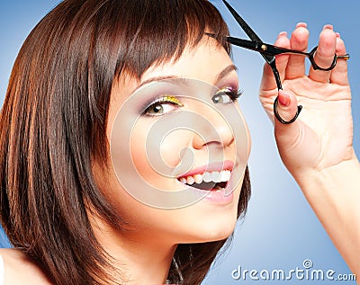 Woman with scissors Stock Photo