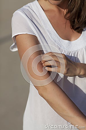 Woman scratching Stock Photo