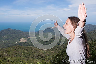 Woman screams in the mountains Stock Photo