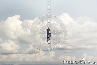 Woman in search of freedom climbs a surreal staircase that descends from the sky Stock Photo