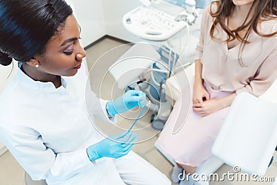 Woman seeing gynecologist doctor to check for STD Stock Photo