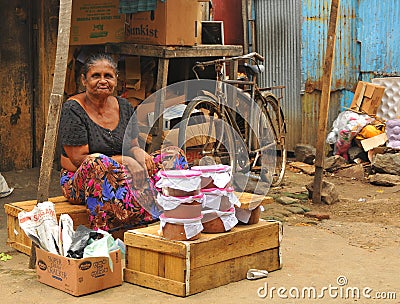 Woman selling curd - Tangalla Market (Sri Lanka) Editorial Stock Photo