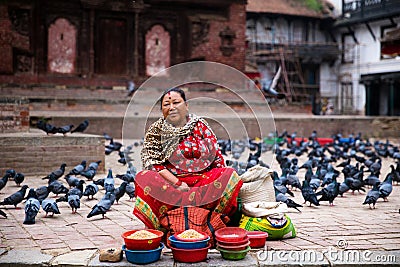Woman selling Kathmandu Durbar Square, Nepal Editorial Stock Photo