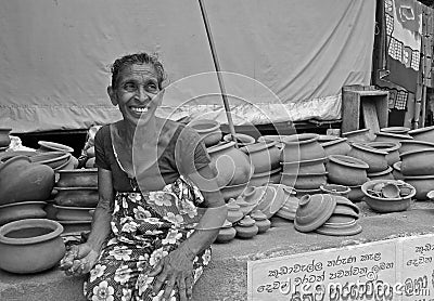Woman selling pottery- Tangalla Market (Sri Lanka) Editorial Stock Photo