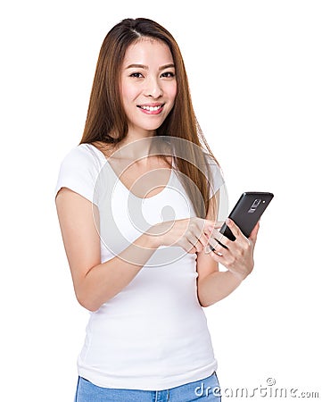 Woman send message on mobile phone Stock Photo