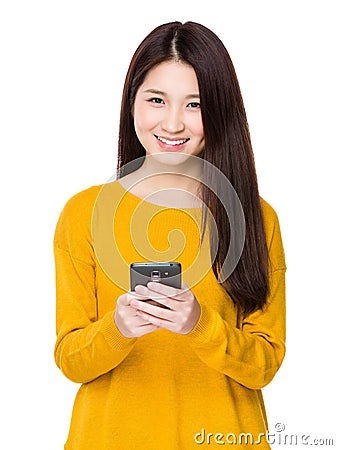 Woman send message via mobile phone Stock Photo