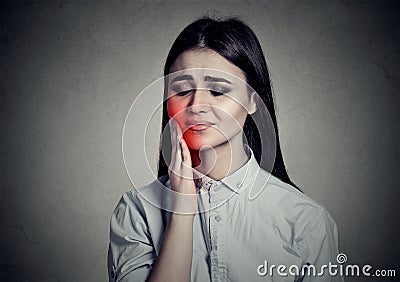 Woman with sensitive toothache crown problem suffering from pain Stock Photo