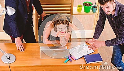 Woman sexy attractive female working with men colleagues. Busty colleague. Sexual attraction. Stimulate sexual desire Stock Photo