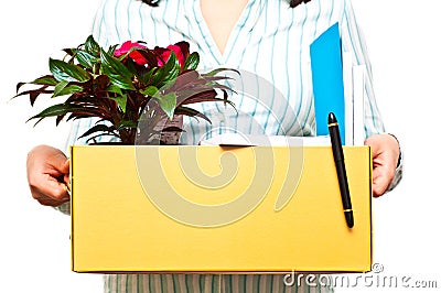 Woman in a shirt holding a box with her belongings Stock Photo