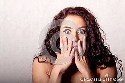 Woman with shocked facial expression Stock Photo