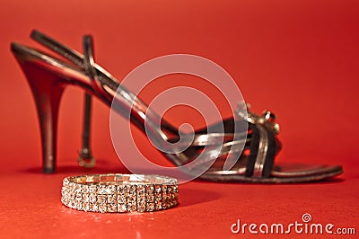 Woman shoe and diamond bracelet Stock Photo