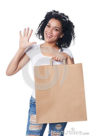 Woman with shopping bag showing five fingers Stock Photo